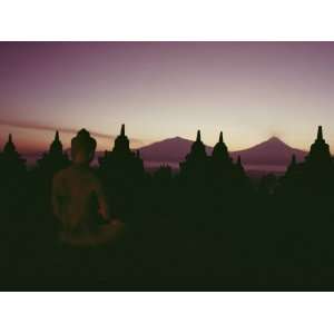  A Buddha Sits in the Silence Amid 1200 Year Old Stupas at 