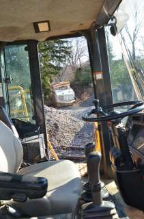   comes with a 60 x 60 hydraulic forks a 3 25 yard side dump bucket and
