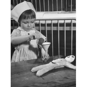  Carae Schrader Playing with a Doll at the Childrens 