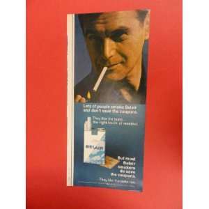  BelAir cigarettes, 60s Print Ad (man lighting cigarette 