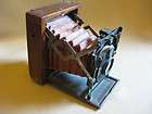 Contessa Nettel photo camera in mahogany case brown bel