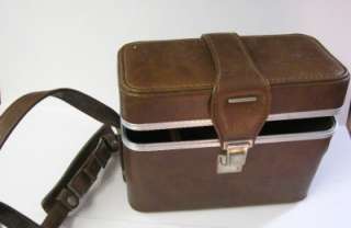  this nice large tan leatherette camera case. Was orginially for Bell 