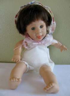 Baby Doll with Sticking Out Tongue  