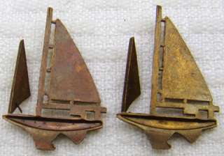 vintage brass stampings detailed small sailboats  