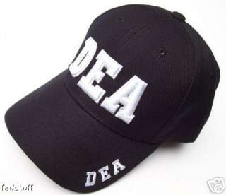 Black Cap features Bold, 3 D, Raised Embroidered White Letters.