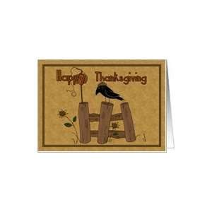 Happy Thanksgiving primitive art pumpkin with crow sitting on a wooden 