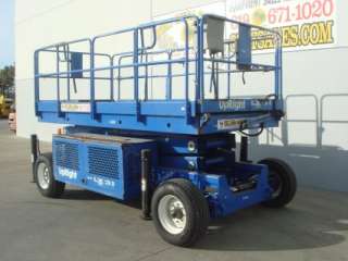2003 Upright LX31 Electric Scissor Lift with Outriggers  