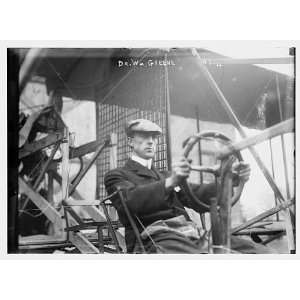  Dr. W. Greene,at pilot wheel of aeroplane