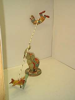 FLYING CIRCUS WIND UP GOOD CONDITION BY UNIQUE ART  