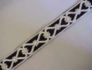   . Clear rhinestones in prong settings provide sparkling accents