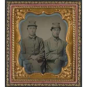  Two unidentified soldiers in Confederate uniforms,hats 