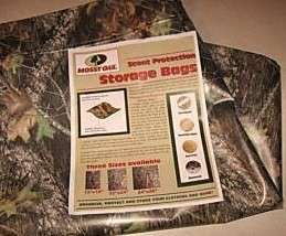   auction is for 4 Mossy Oak Scent Free Clothes Storage Bags 22 x 27
