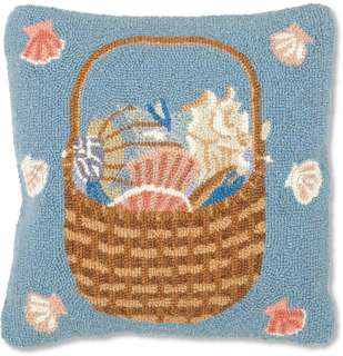   beautiful basket filled with seashells this pillow measures 14 x