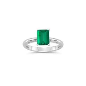  0.68 Cts of 7x5 mm AAA Emerald Emerald Scroll Ring in 