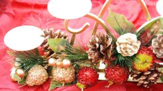 GOLD CANDELABRA with pine cones, fruit & 5 round cream candles 