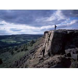  Walker on High Rocks, Froggatt Edge, Derbyshire, England 