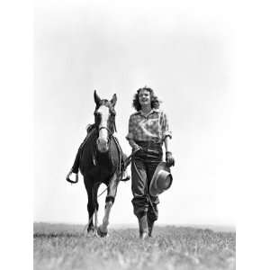  Woman Walking Beside Horse Holding Cowboy Hat Photographic 