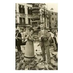  Feeding the Pigeons in the City Square Premium Poster 